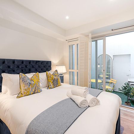 Modern 2Bd Hideaway In Belgravia With Private Patio 10 Mins Walk To Harrods ลอนดอน ภายนอก รูปภาพ